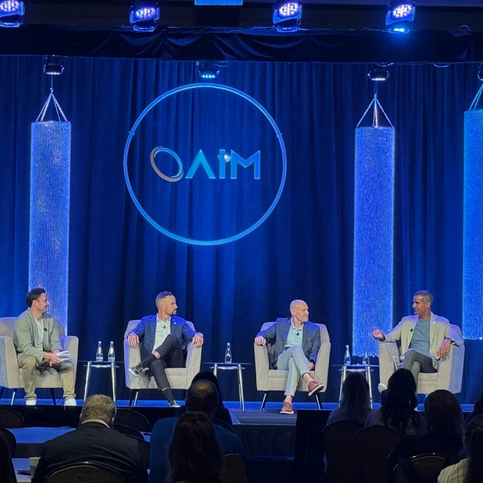 Panel on stage at AIM